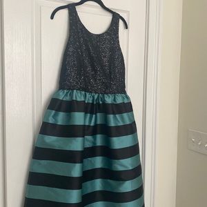 Anthropologie; size 12; black sequins on top; black and green stripe on bottom
